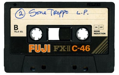 Lot 275 - George Harrison Handwritten Inlay for Gone Troppo Tape Cassette (UK)