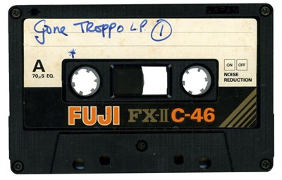 Lot 275 - George Harrison Handwritten Inlay for Gone Troppo Tape Cassette (UK)